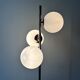 Cluster floor lamp with 3 spherical lamps in gold metal and white glass