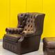 Brown leather chesterfield wing chair with Ottoman