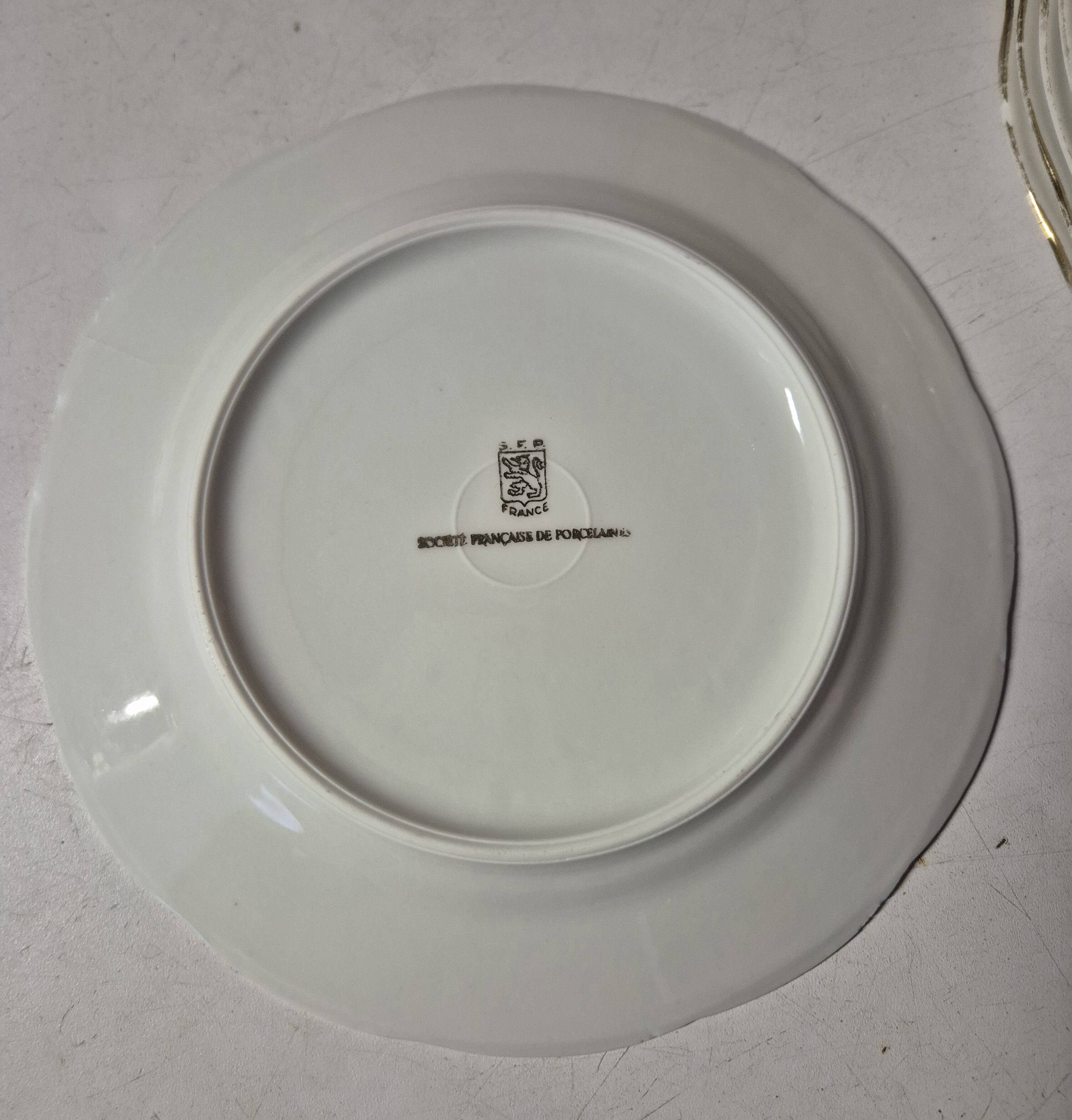 Set of 7 fine porcelain dessert plates with gilding, SFP, French company