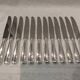 12 silver-plated table knives by Ercuis, Senlis pattern, 24.7cm