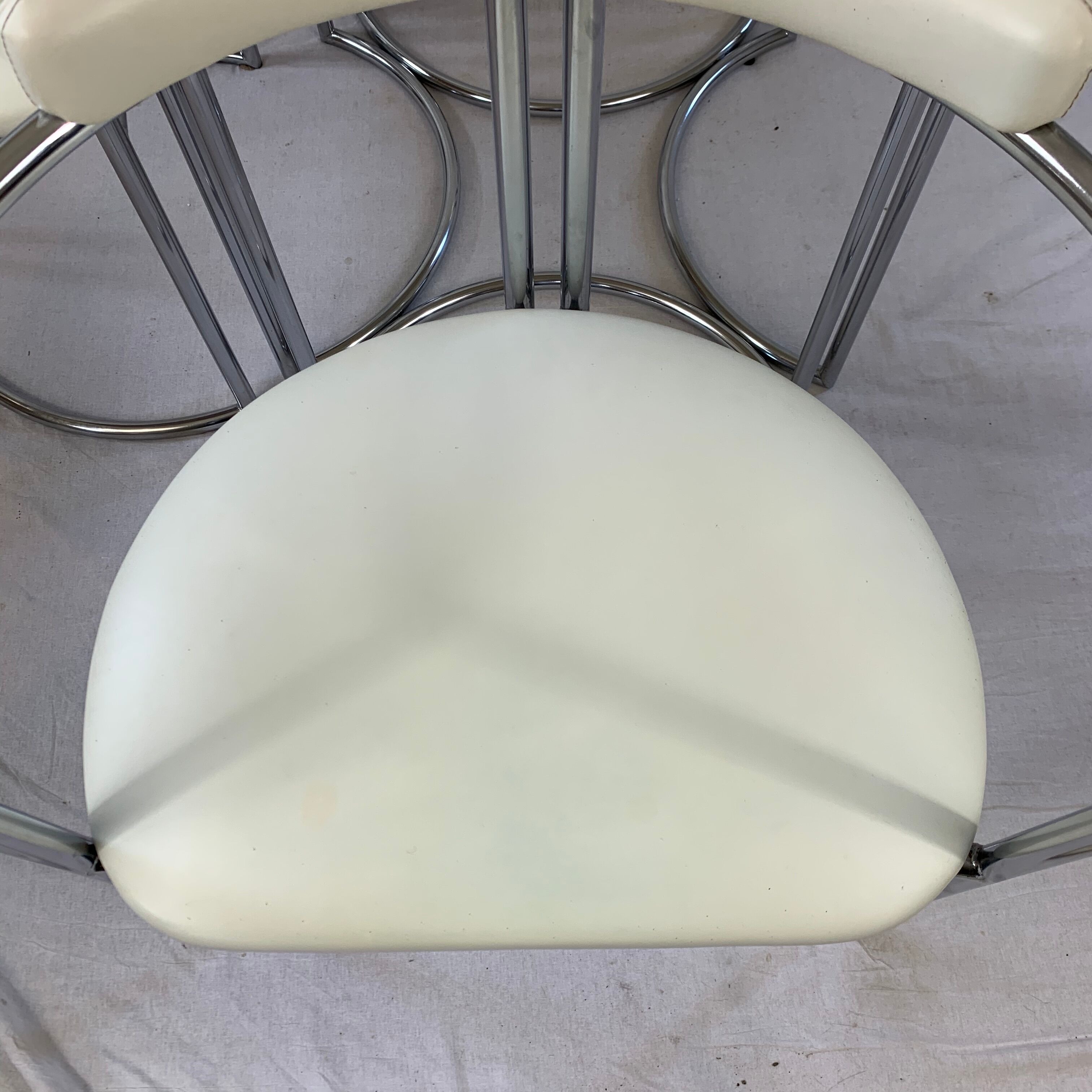 Chrome table and two modernist chairs