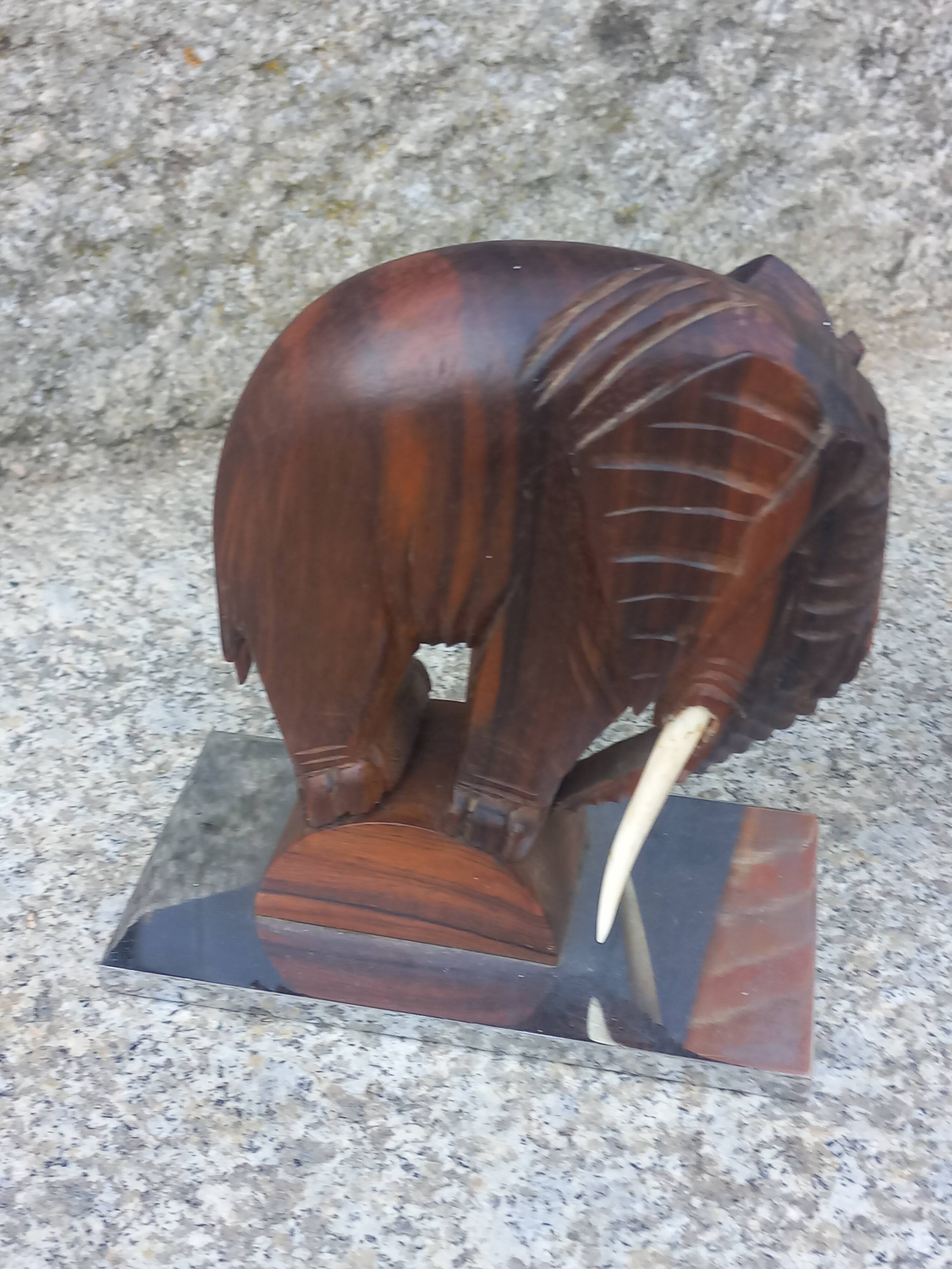 Pair of Art Deco elephant bookends in rosewood with chrome base.