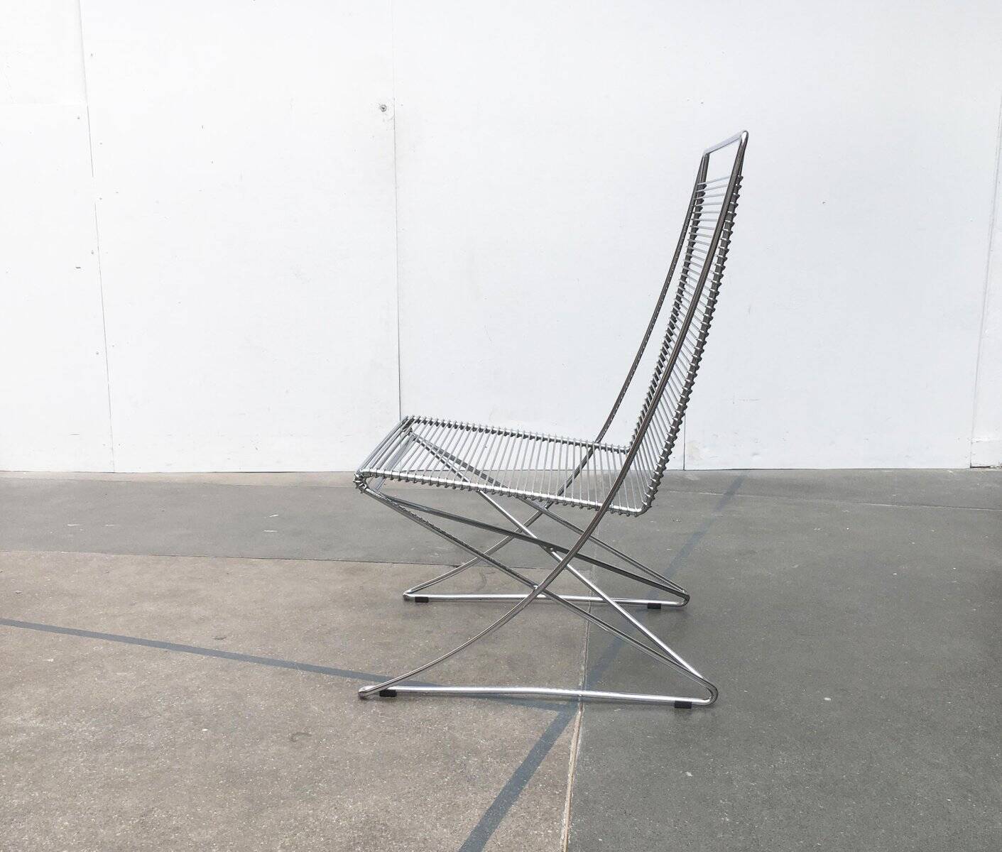 Vintage German Kreuzschwinger lounge chair by Till Behrens for Meyer Stahlmöbel, 1980s.