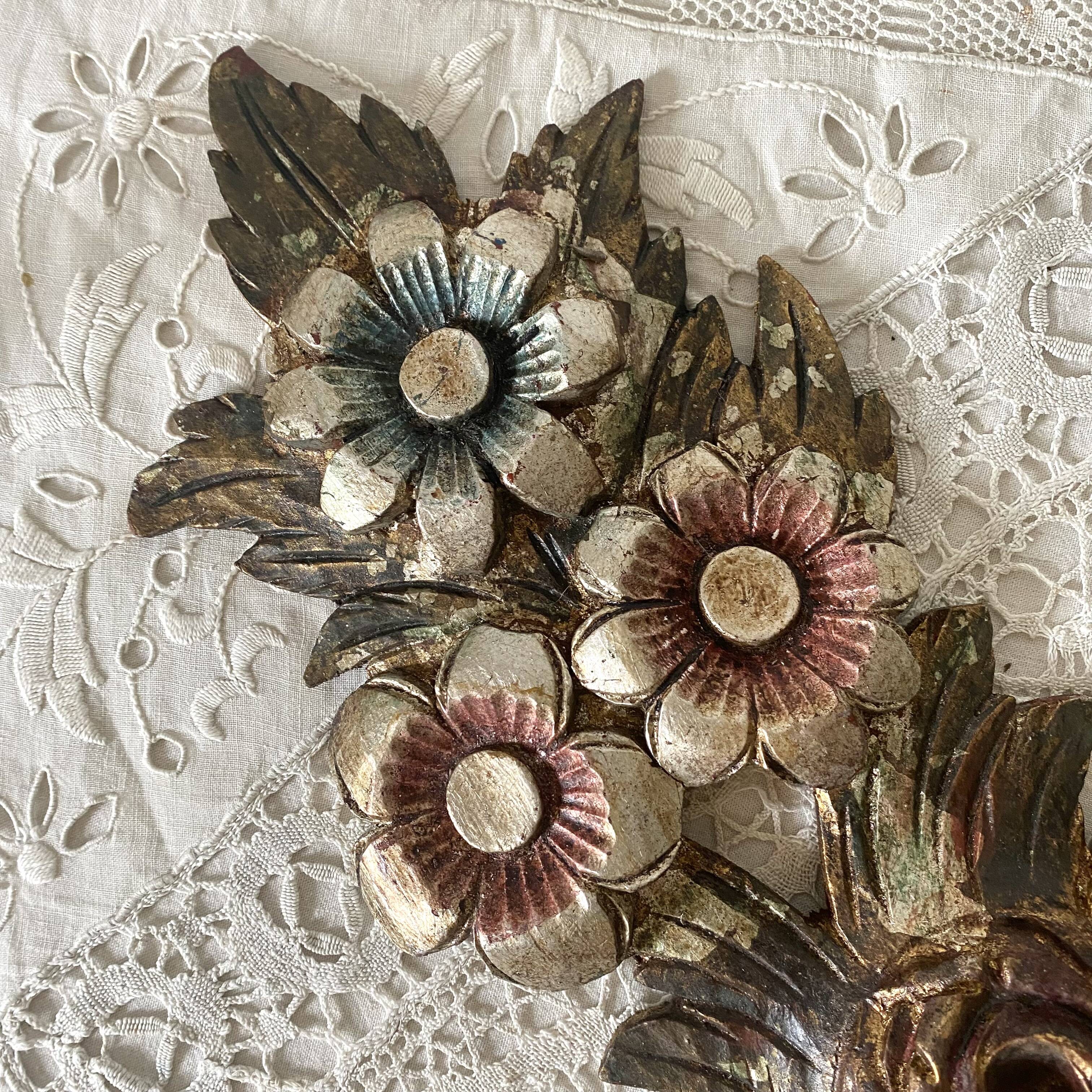 Decorative carved wooden ornament bouquet flowers and ribbon