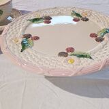 Footed dessert plate in barbotine porcelain, marked FG.