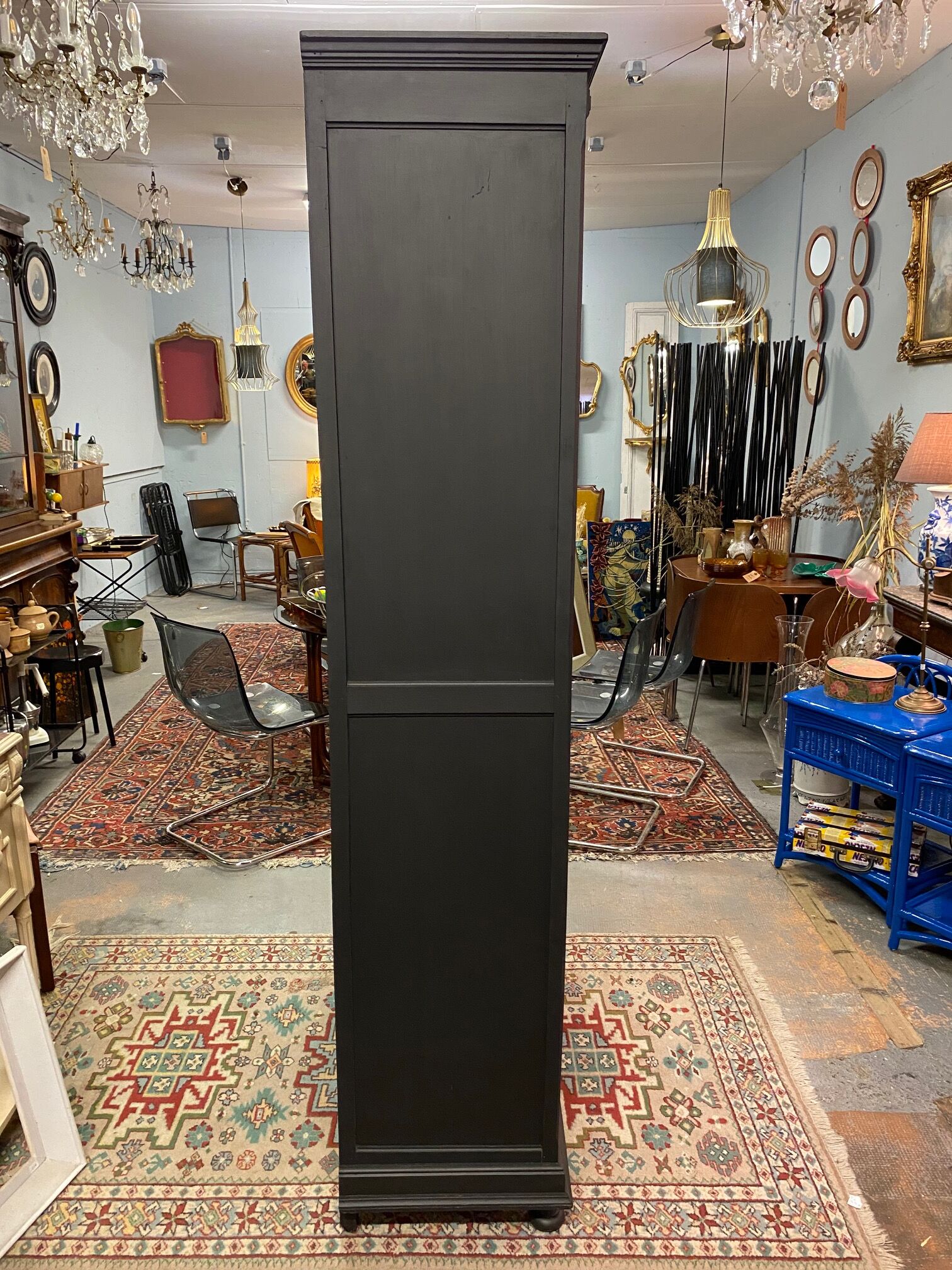 Black bookcase with glass doors