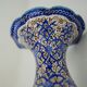 Piriform vase with a flared metal collar enamelled with a polychrome decoration, marked "Amini Iran" on the reverse.