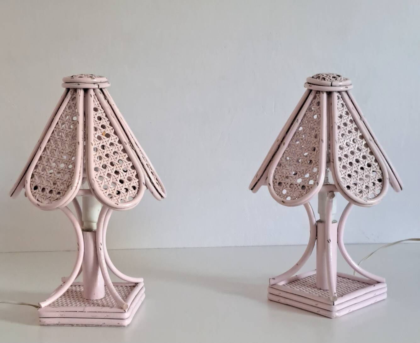 Pair of cane and bamboo bedside lamps