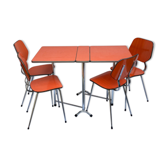 Table en formica orange et 4 chaises
