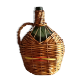 Surrounded by Wicker bottle