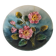 Decorative plate with relief floral pattern in majolica.
