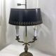 Lampe bouillotte empire à deux lumières