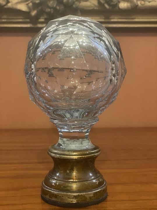 Antique faceted crystal ramp ball.
