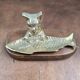 Vintage cat fish catchall in brass on a solid wood base.