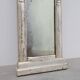 Pair of Neoclassical Silver Leaf Pier Mirrors with Ringed Columns and Corni