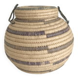 Small round basket in two-tone straw basketry