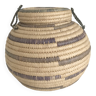 Small round basket in two-tone straw basketry