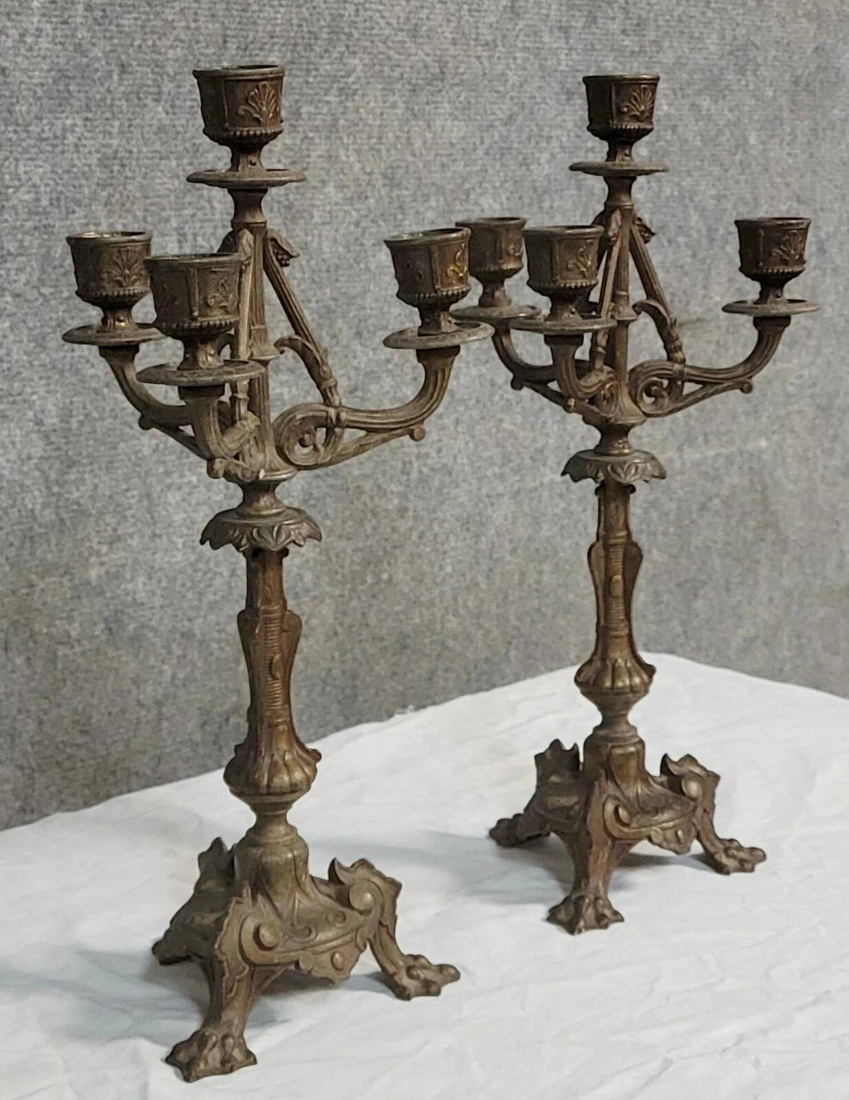 Pair of antique candelabra in patinated bronze spelter