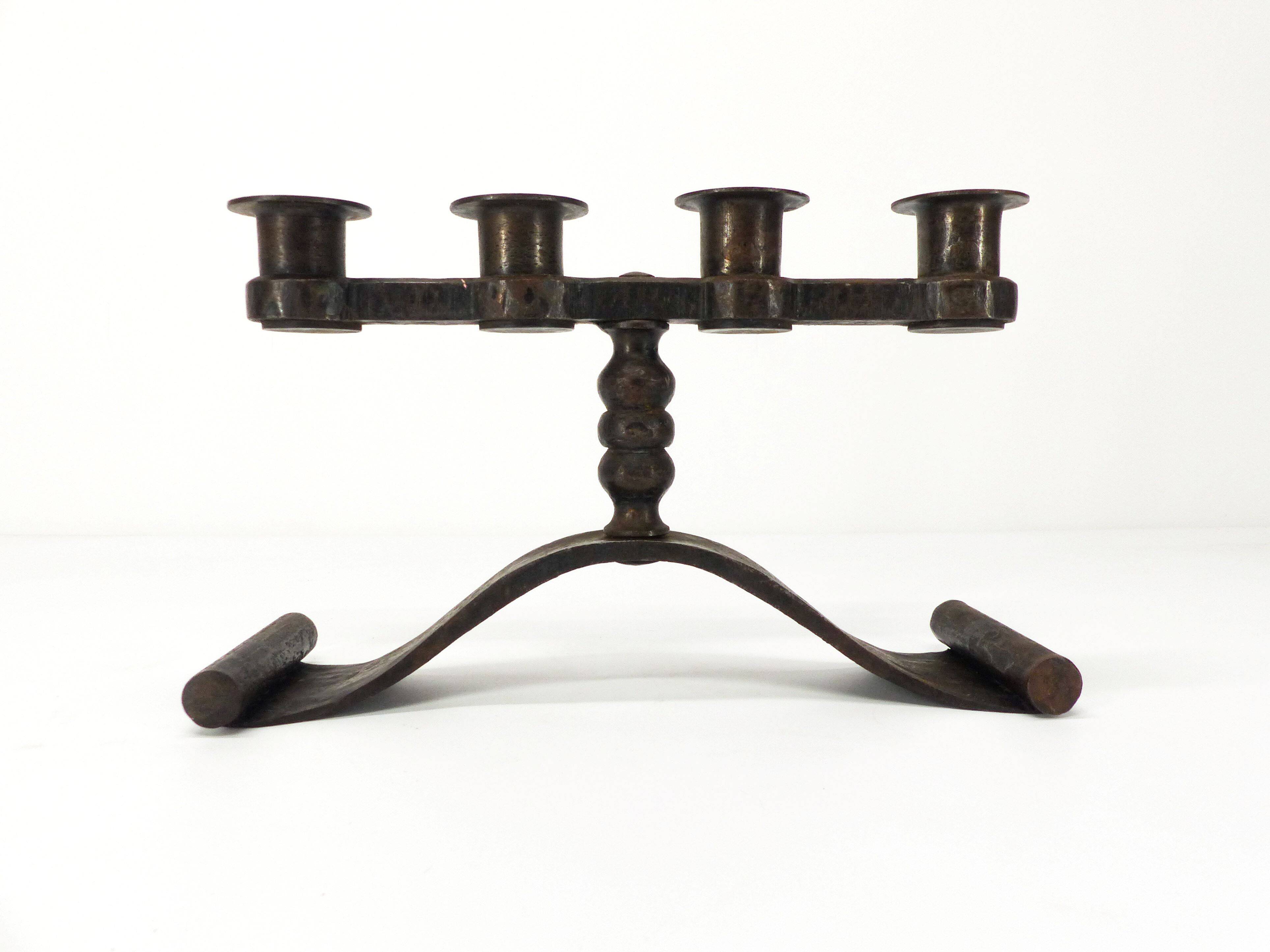Wrought iron chandelier with four lights, Charles Piguet, Switzerland, circa 1930.