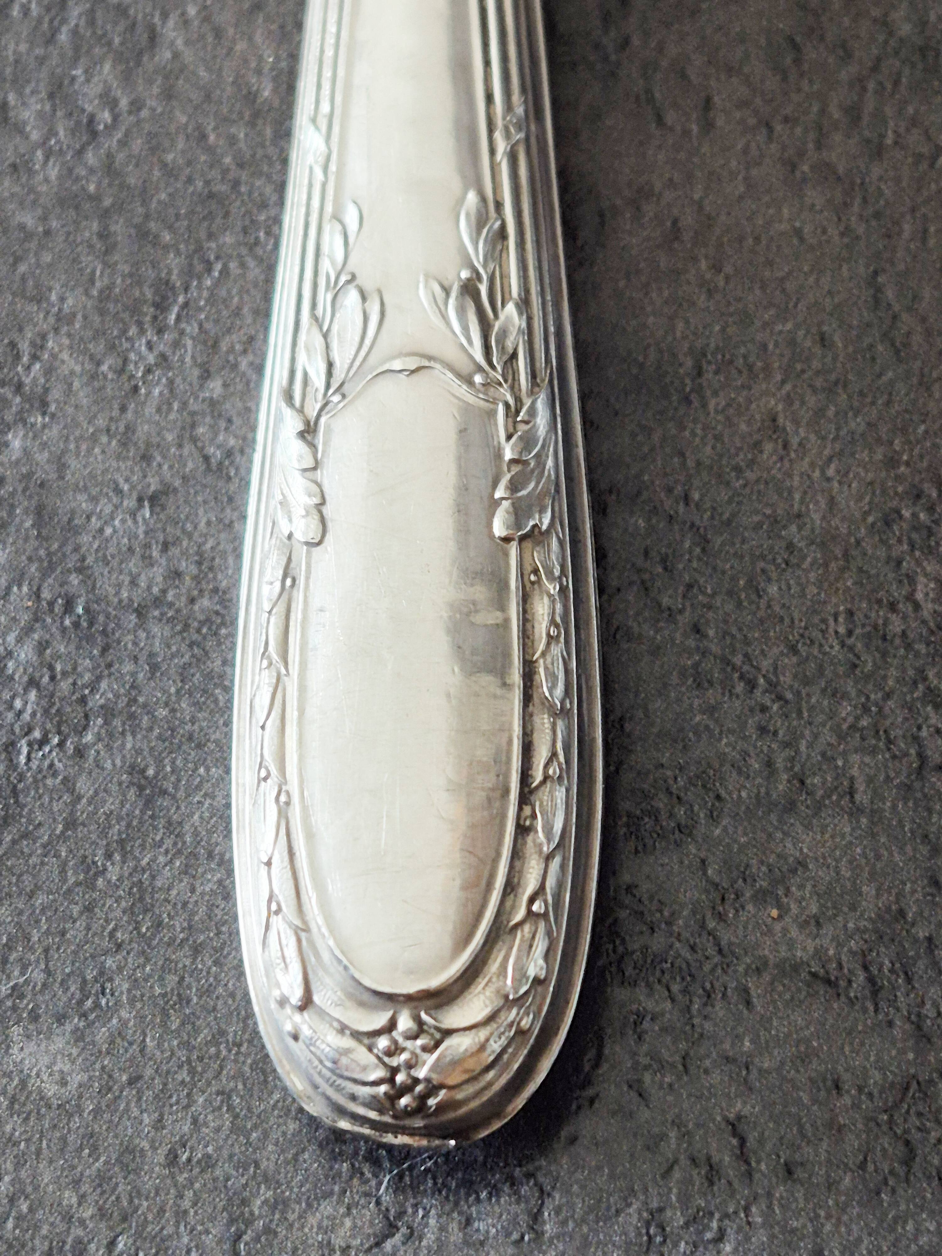 Set of 11 vintage knives, steel blades and silver handles