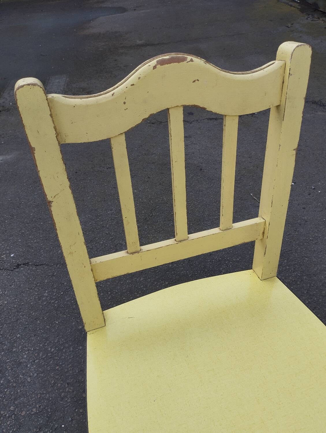 Pair of wooden and yellow formica chairs