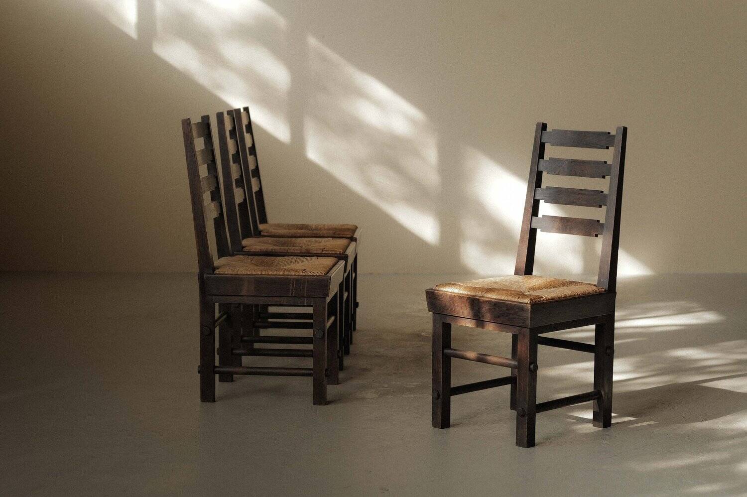 Modernist chairs in oak and woven straw, France, circa 1948