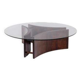 Rosewood coffee table, concave shape. 1970s.
