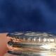 Individual salt shakers in 800 silver with two hallmarks and fluted crystal