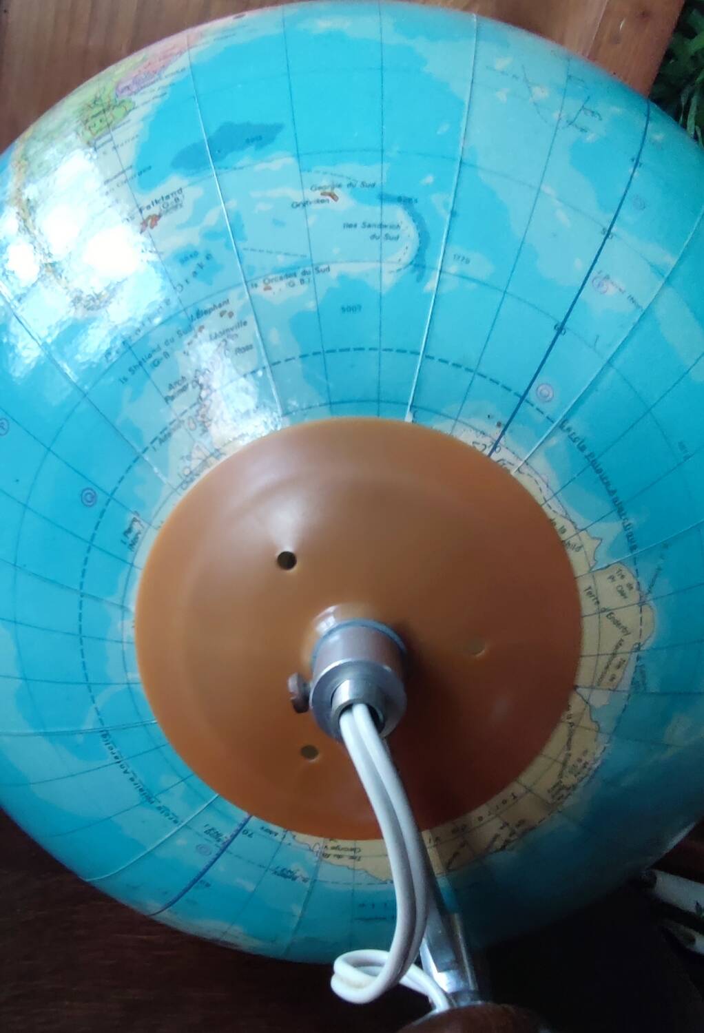 Antique illuminated globe world map made of glass
