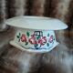 Antique sauce boat in Longchamp ironstone.