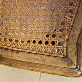 Chair with caned seat and back made of wood