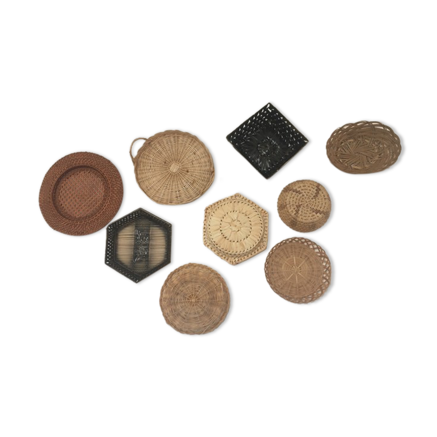 Wall composition of 9 wicker baskets and trays.