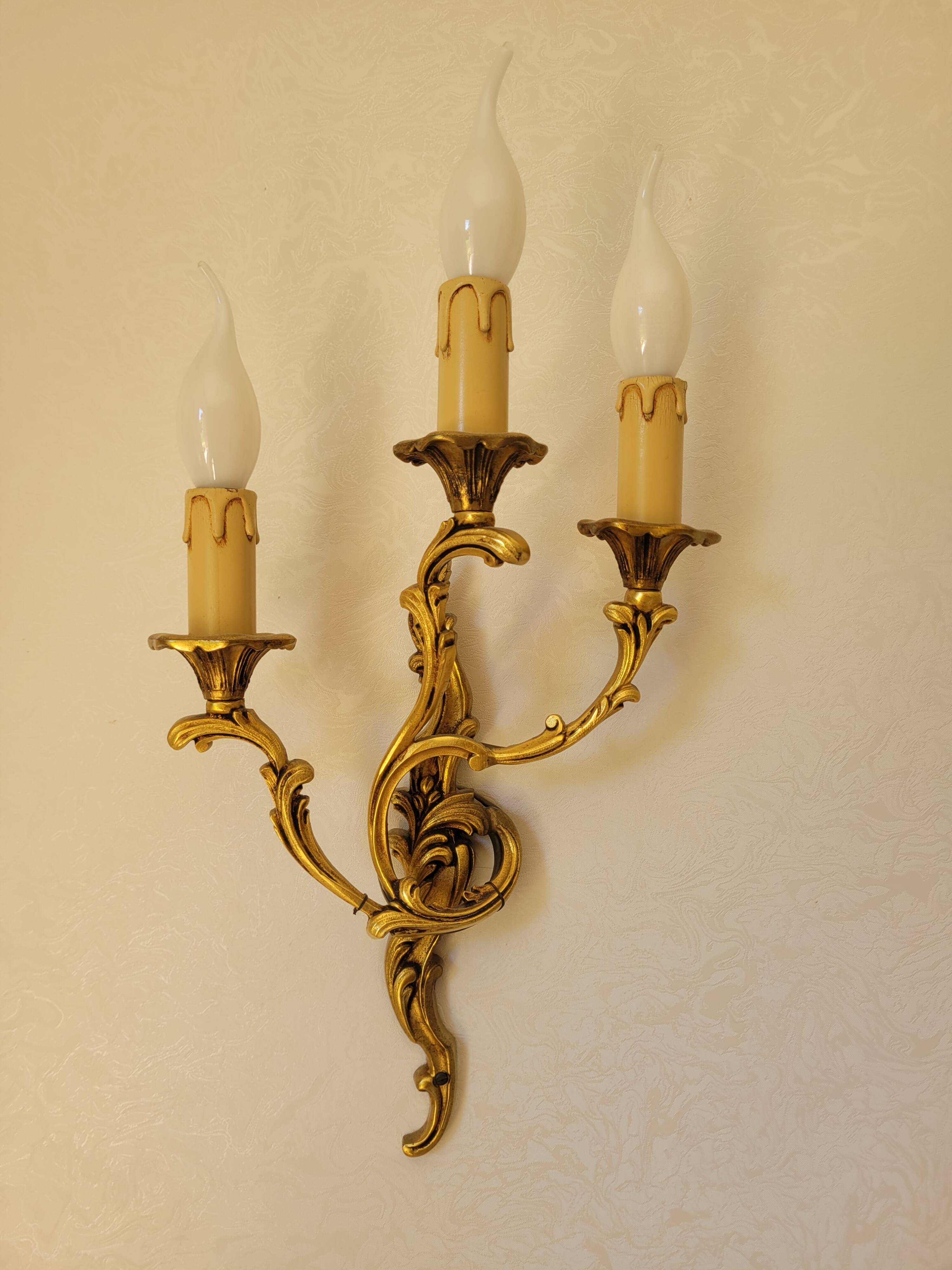 2 gilded bronze wall lights