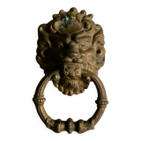Lion door knocker, in brass