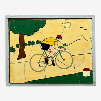 Cadre puzzle en bois des années 30/40 représentant un cycliste