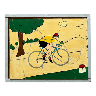 Cadre puzzle en bois des années 30/40 représentant un cycliste