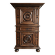 Antique Louis XIII bonnetière in carved solid wood.