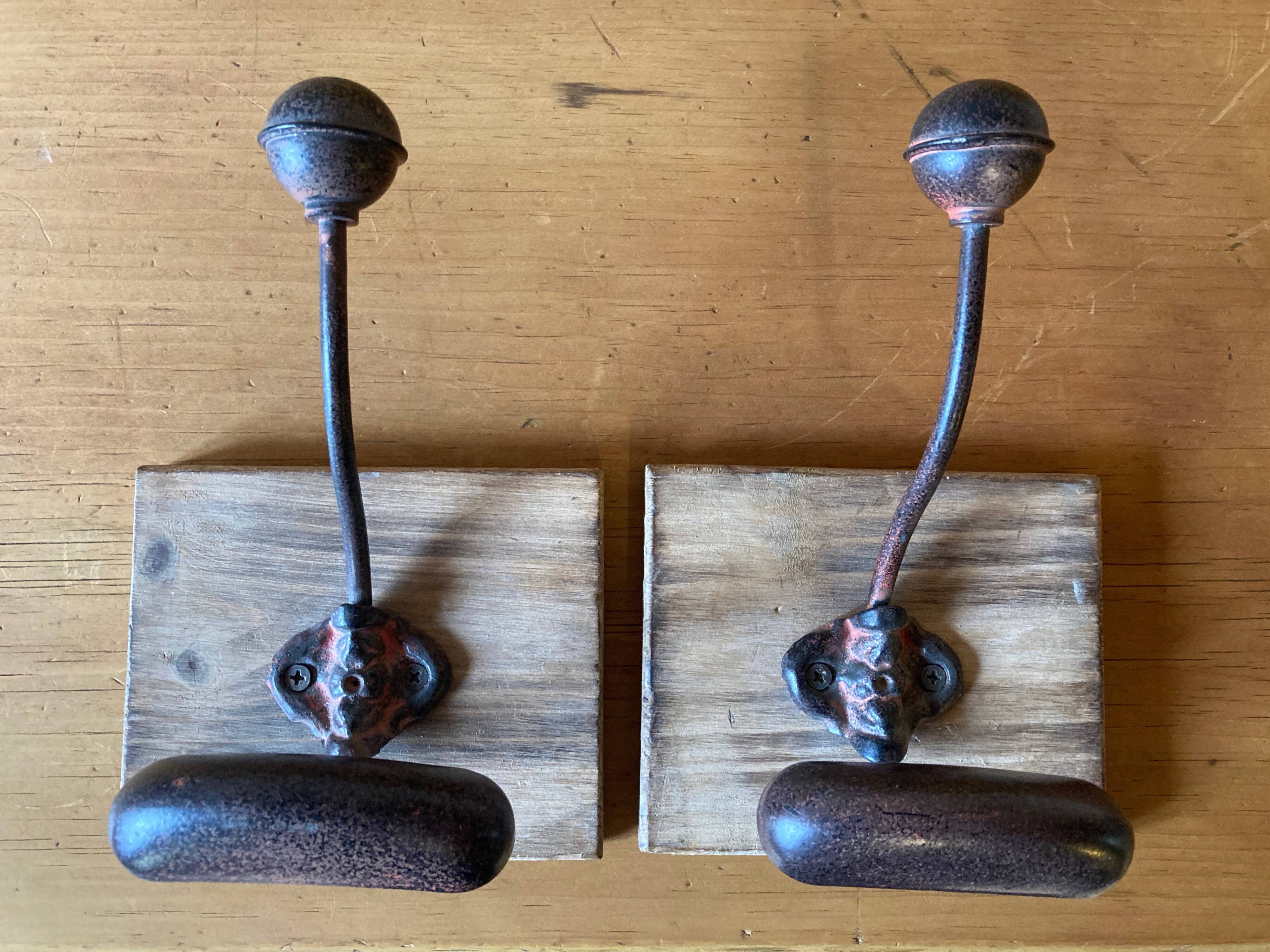 Wooden and metal coat hooks