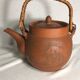 Antique terracotta teapot