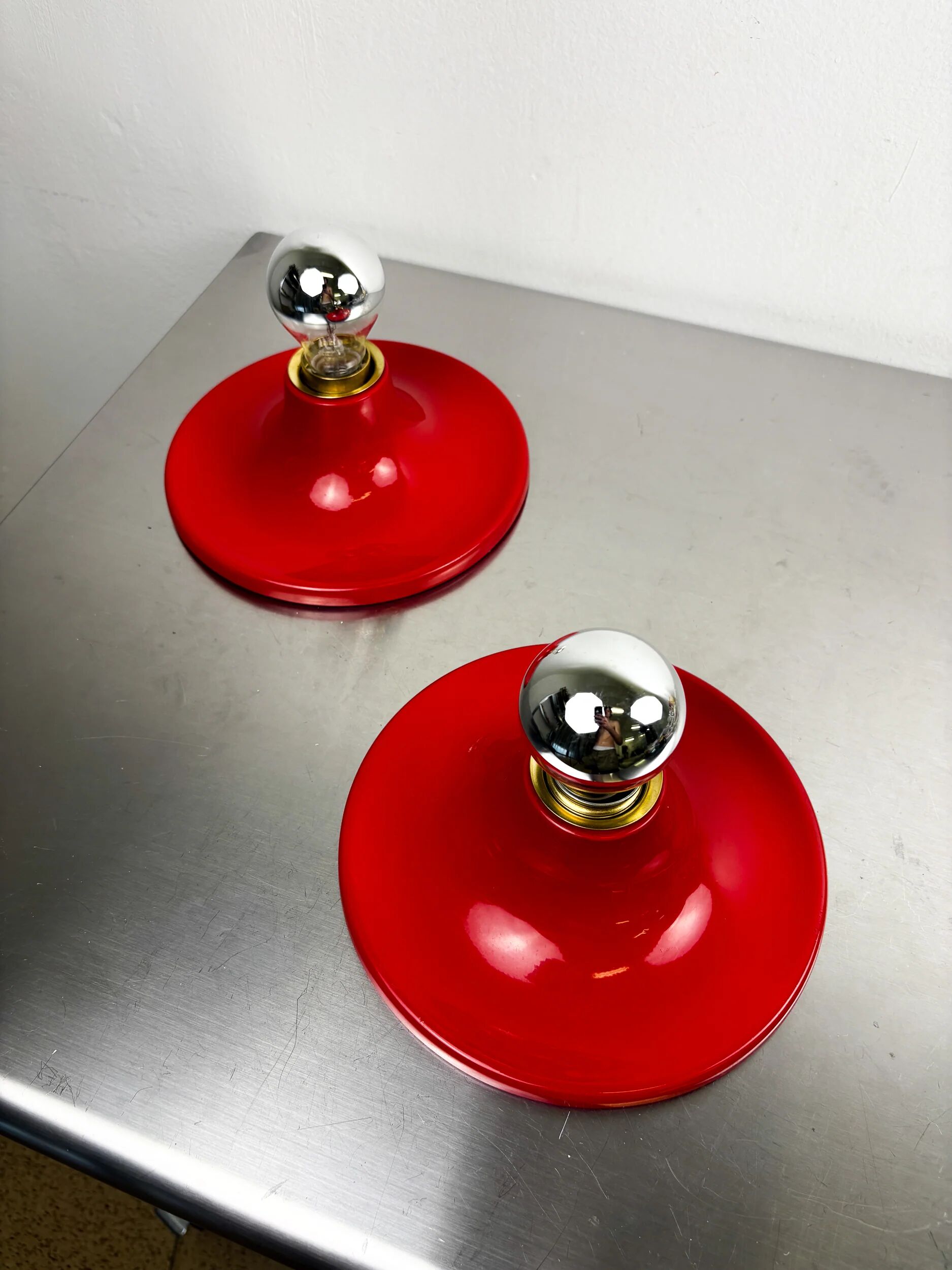 Pair of red Targetti Sankey sconces, 1970s, Italy