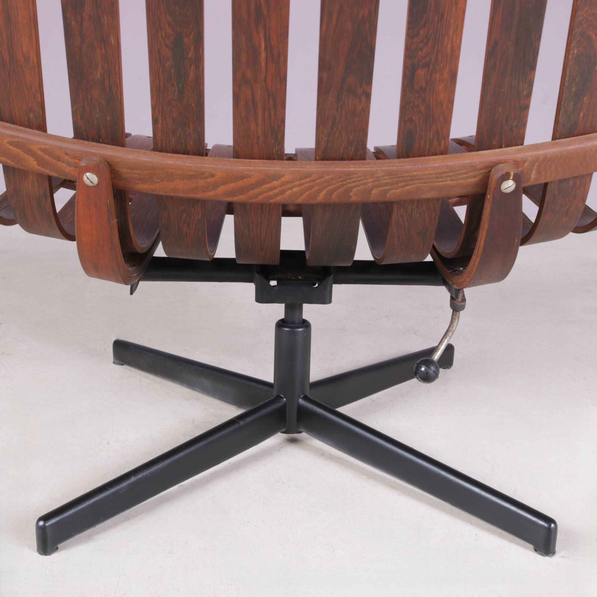 Lounge chair Rosewood with black metal cross base Hans Brattrud 1960s