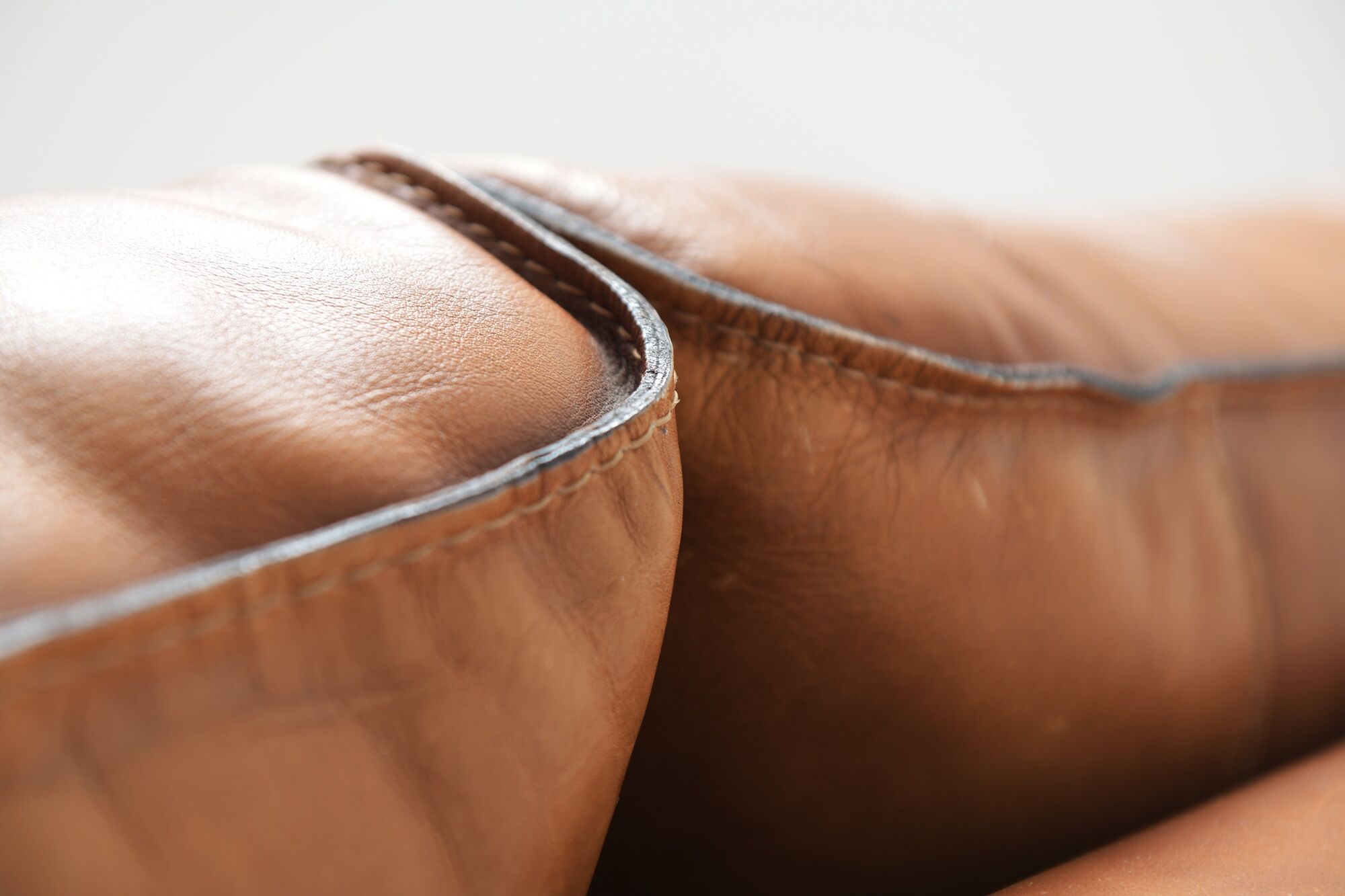 Cross 0302 cognac leather sofa by  Roche Bobois France