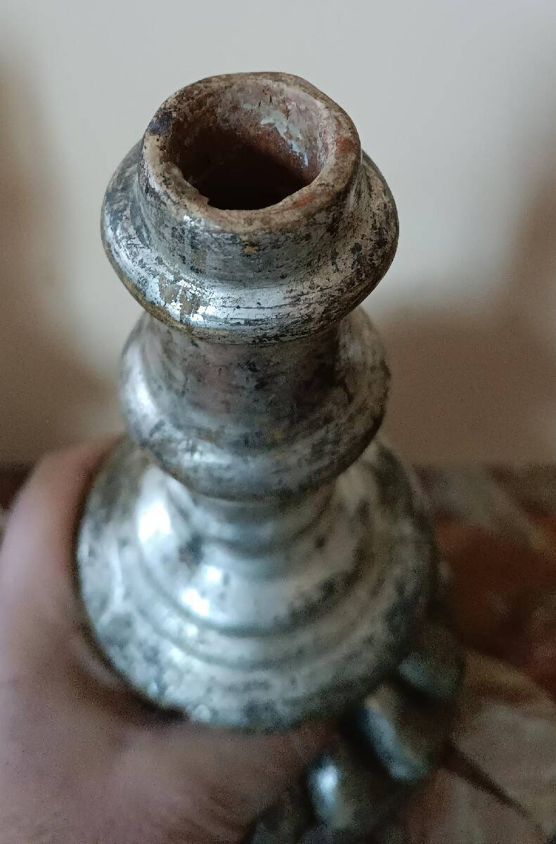 Rare pair of antique silvered terracotta candlesticks from the 17th century.
