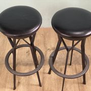 2 Yamakado designer swivel stools in black leather