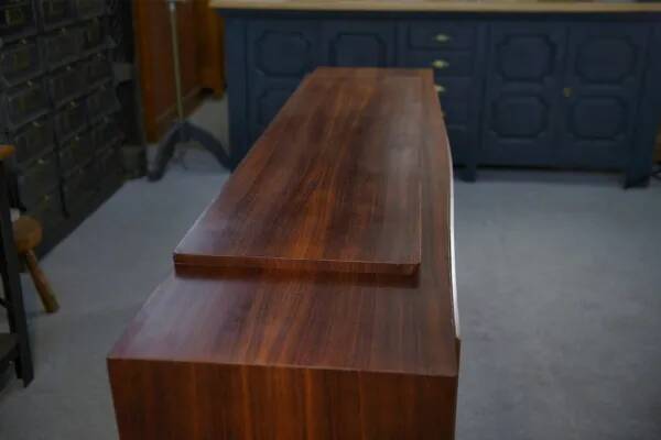 Art Deco rosewood sideboard with gilt door, attributed to Maison Dominique, 1940s