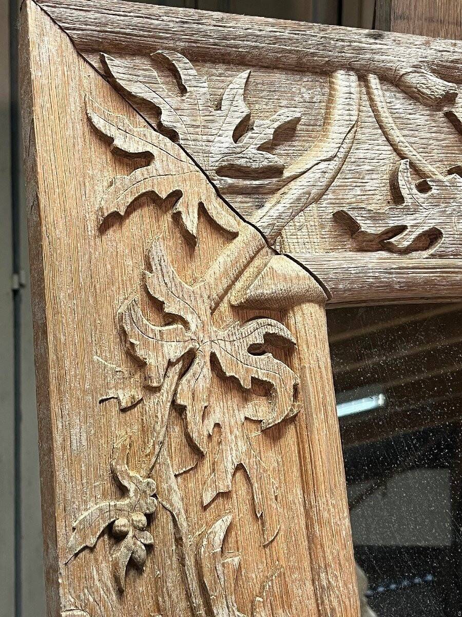 Art Nouveau mirror decorated with poppy leaves, signed by Roger père.