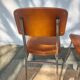 3 chaises vintage en inox et simili-cuir marron