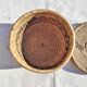 Antique basket with ethnic lid with black/brown and red décor