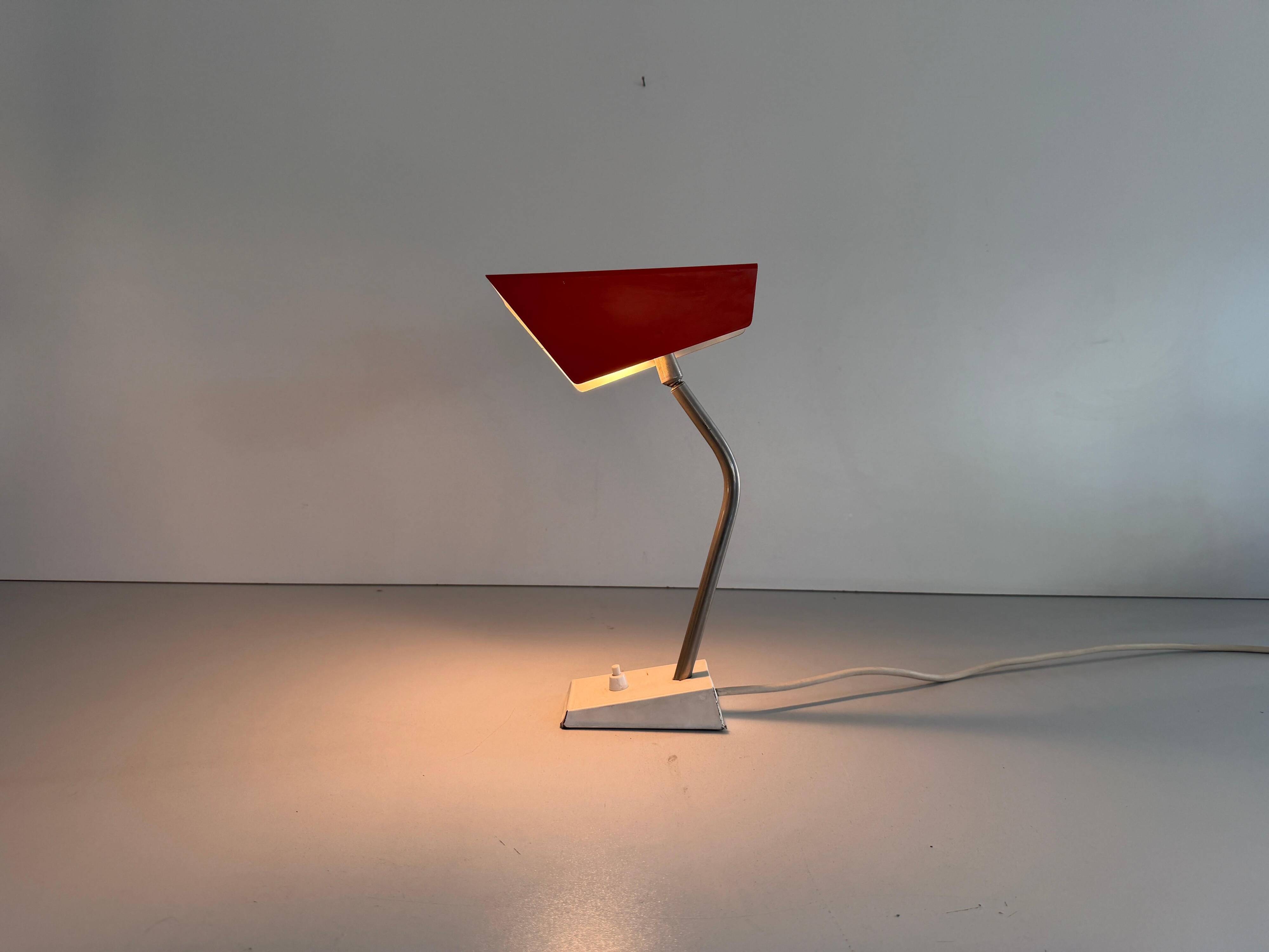 Table lamp with a red metal head, 1960, Germany