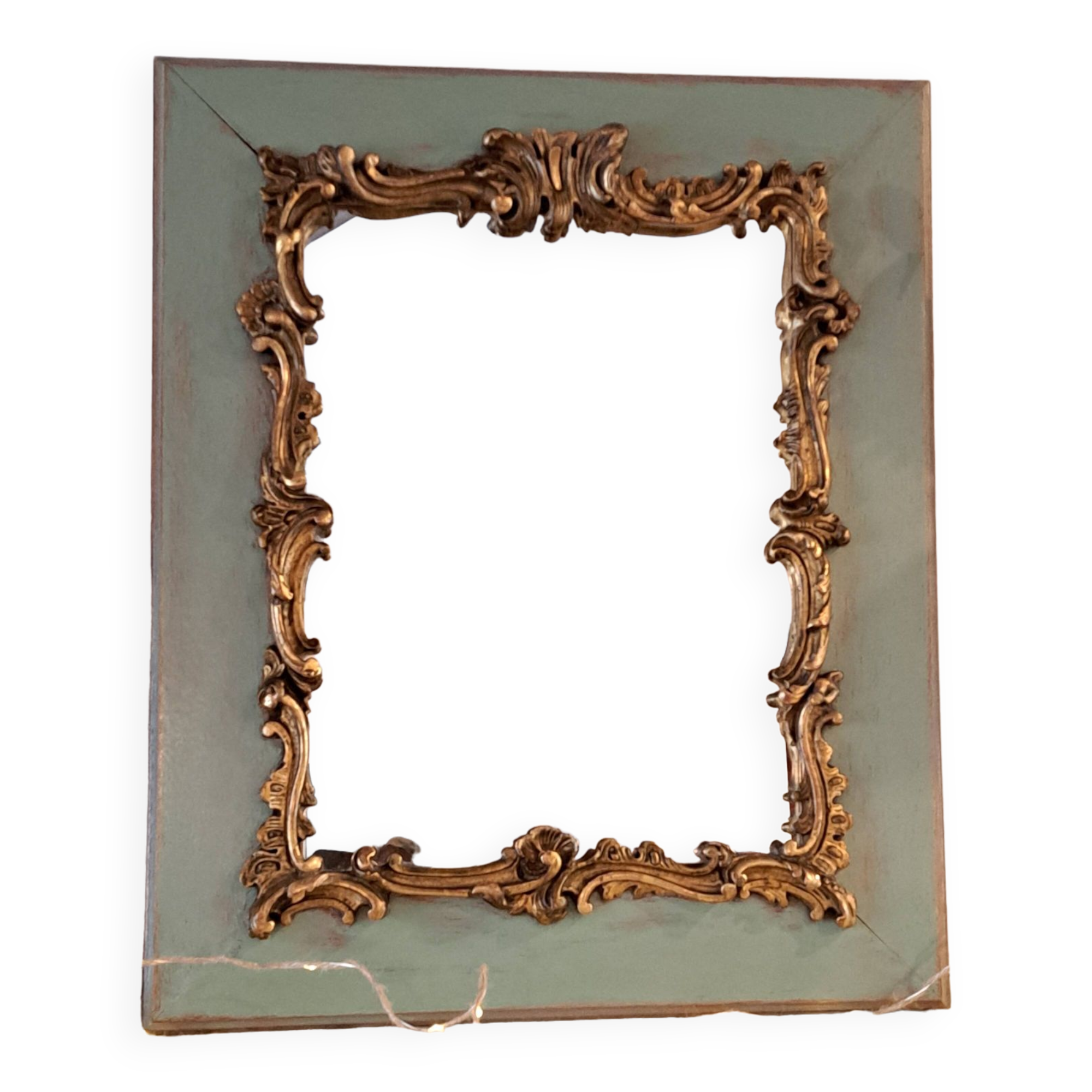 Antique Louis XV style mirror in wood and gilded stucco.